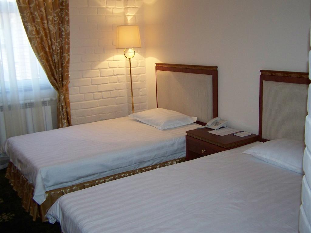 Arien Plaza Hotel Tasken Szoba fotó